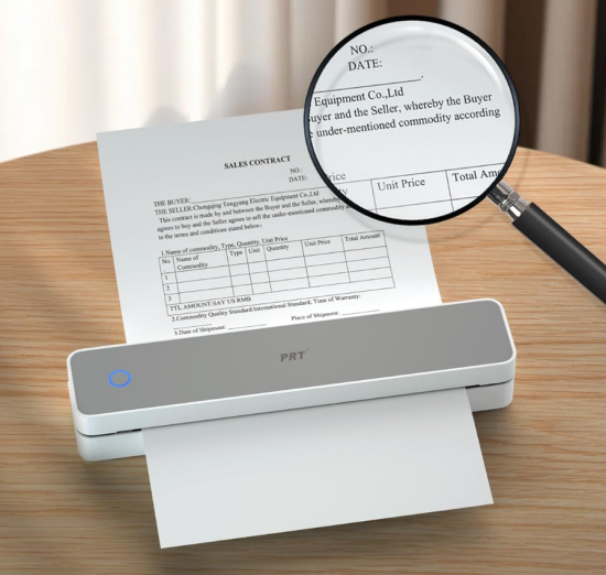 A portable A4 printer in use